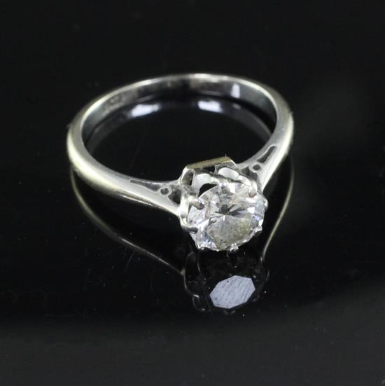 An 18ct white gold and platinum solitaire diamond ring, size L.